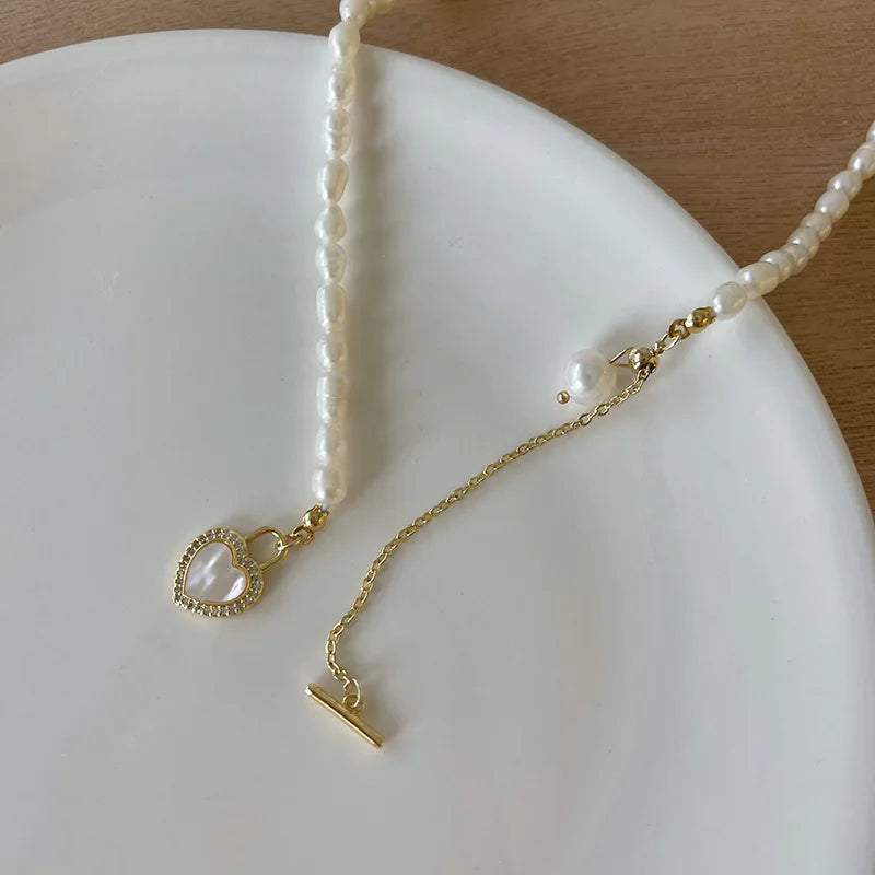 Detailed view of Pearl of My Heart Necklace clasp and chain, highlighting 14K gold-filled elements and freshwater pearls for durability and shine.