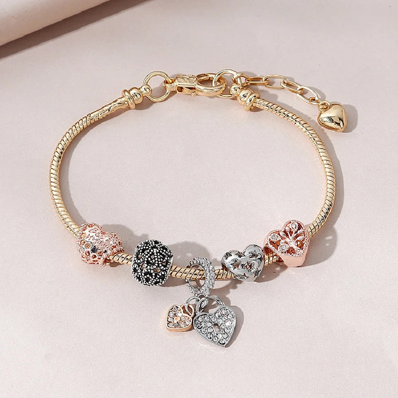 Fashionable Lifebloom Heart Bracelet with symbolic heart charms and Tree of Life centerpiece, ideal for everyday or special occasions.